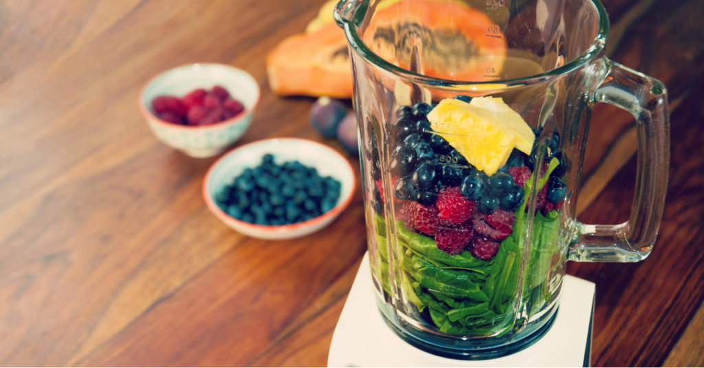 Berries and leafy greens in blender for better sleep