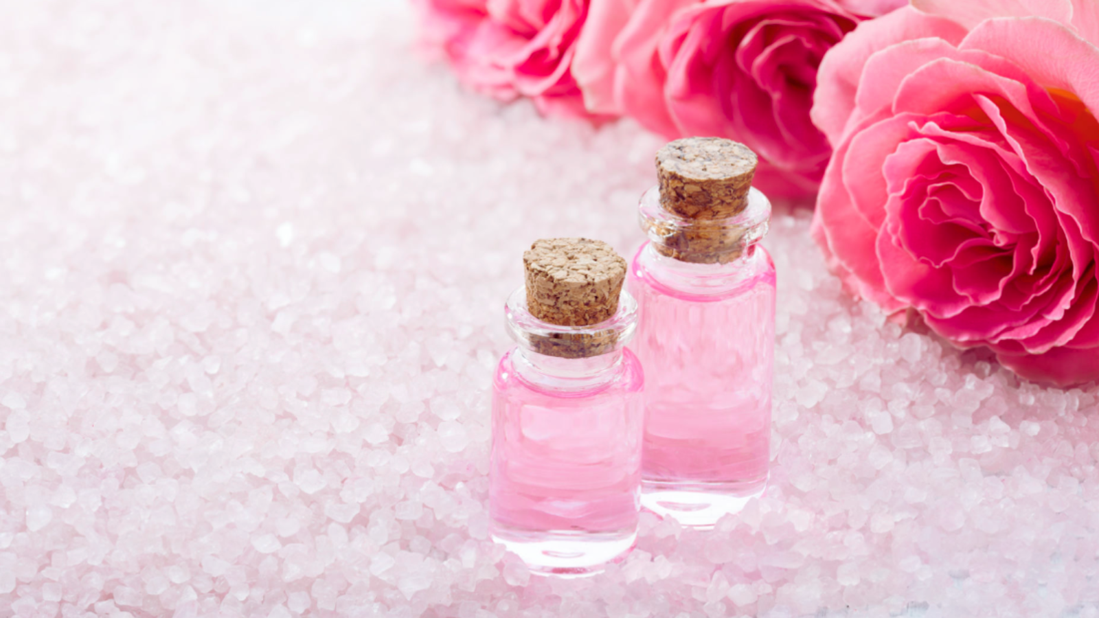 Two bottle jars of rose water